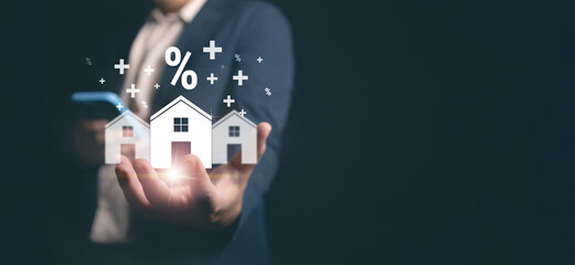 Businessman presenting real estate investment and mortgage interest rate growth concept