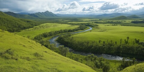 Obraz premium High Angle View Of Lush Green Valley With Winding River
