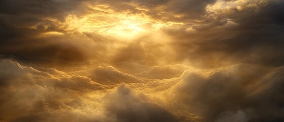 Fototapeta premium Golden clouds illuminated by soft sunlight
