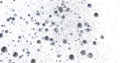 Close-up of many small and large bubbles in a liquid.  Perfect for science, beauty, or technology concepts.