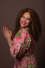 Fototapeta premium Beautiful African American woman with lots of hair