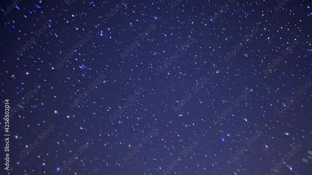 Poster the video captures a serene night sky filled with twinkling stars, creating a calming and infinite a