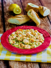 garlic shrimp served with fresh parsley and lemon