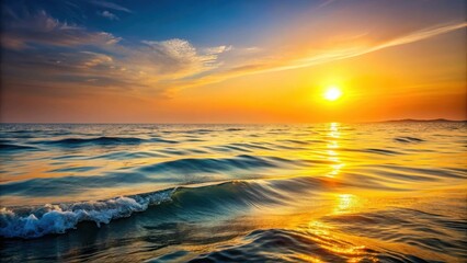 Obraz premium Serene ocean waves reflecting a vibrant sunset glow