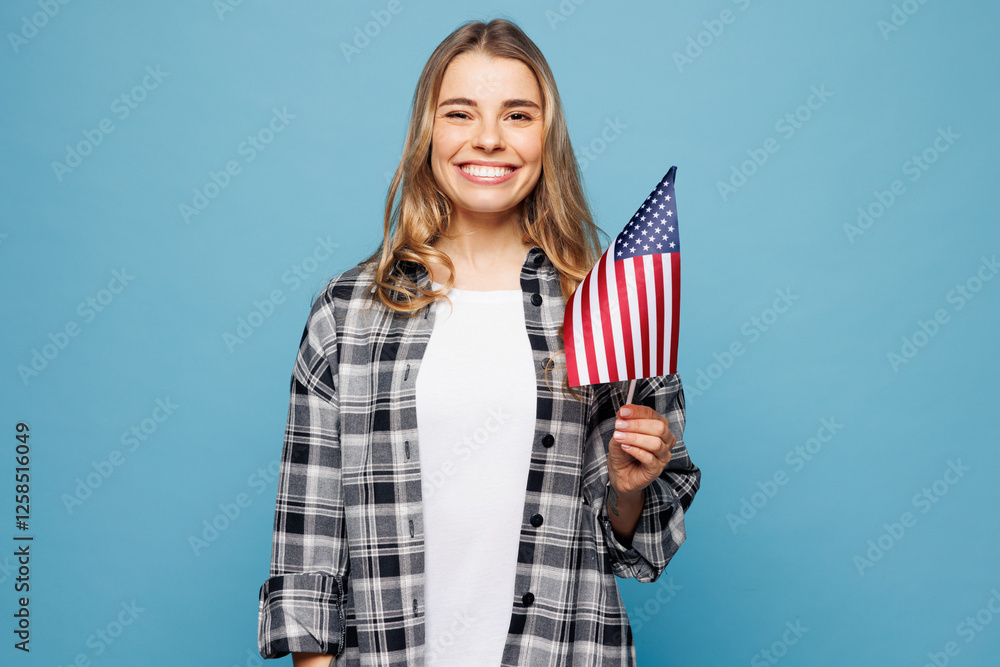 Poster Young smiling cheerful woman she wearing checkered grey shirt casual clothes hold American USA flag look camera isolated on plain pastel light blue cyan background studio portrait. Lifestyle concept.