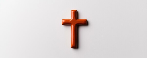Simple Orange Christian Cross on a White Background Symbolizing Faith and Religious Belief