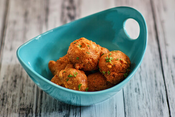 crispy fried seafood fritters served with tartar sauce