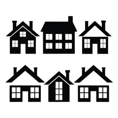 Fototapeta premium Silhouette of a City with Houses and Chimneys