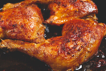 baked chicken legs, with crispy skin, served in a pan, rustic style, homemade, no people,