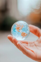 Fototapeta premium Sustainable future global awareness outdoor setting glass globe focused viewpoint environmental concept