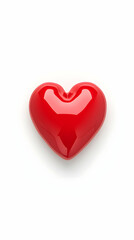Fototapeta premium Red heart lies on white background, representing love and valentines use for greetings