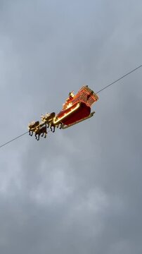 The Flying Santa Claus show, the iconic attraction of Montreux No&euml;l, Switzerland. The flight goes from the CGN landing stage to the Market Square (Place du March&eacute;).