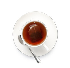Tea bag in cup with hot drink isolated on white, top view