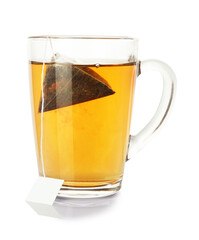 Tea bag in glass cup with hot drink isolated on white