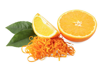 Pile of fresh orange zest, cut fruit and leaves isolated on white