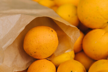 Close up of oranges on the local Farmers market. Shopping At Farmers Market Stall. Part of the series.