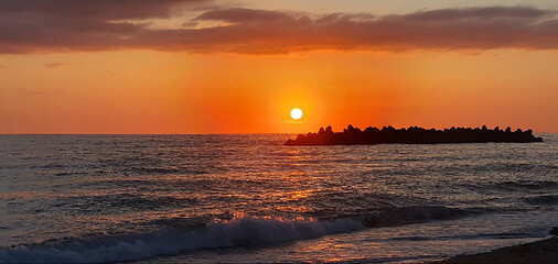 Sunset over the sea, sunset on the beach