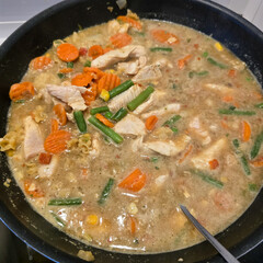 Creamy Chicken Curry and Vegetable Stew Cooked and Served Warm in a Delicious Pan Dish