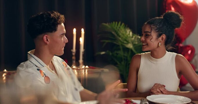 Happy, couple and laughing on date at restaurant for romance, valentines day celebration and fine dining. Smile, people and communication for anniversary, commitment and roses of hospitality service