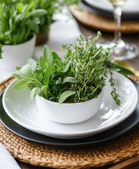 A bowl filled with assorted fresh herbs sits elegantly on a plate atop a wooden table, showcasing vibrant colors and textures in a natural setting.