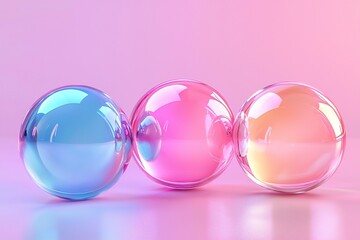 Three iridescent glass spheres pastel pink blue and orange on pink background abstract colorful