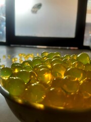 Yellow glass balls, close up of a yellow glass beads, yellow glass beads, yellow bubble, yellow...