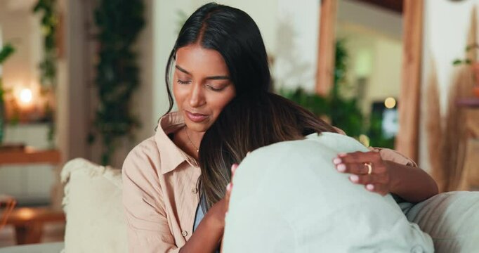 Women, crying and friends with hug for support, love or trust from grief, loss or breakup in living room. People, empathy and embrace for emotional trauma, sad news or tough time care in home lounge