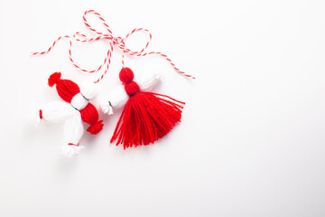  Traditional Martenitsa on white background. Baba Marta, greeting card. Flat lay