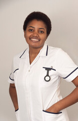 England United Kingdom, 03.02.2025. Nurse in white coat with a watch and pen in pocket.