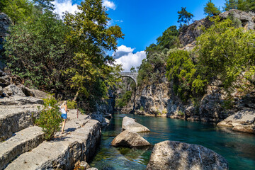 The Roman bridge at Koprulu Canyon, Antalya, Turkey/  Popular tourist attraction.  