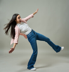 Surprised woman losing balance