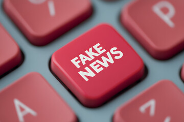 Keyboard key with "FAKE NEWS" text. Digital media, misinformation, public trust. Information credibility concept. Blurred keys around the focus point.