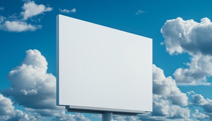 A blank billboard stands alone under a bright blue sky with puffy white clouds