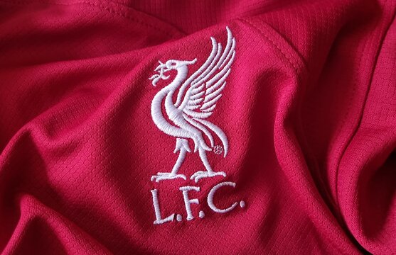 Liverpool football club logo on tshirt.