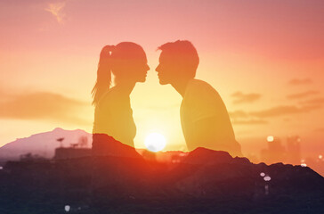Feeling in love, Young romantic couple silhouette kissing the sunset 