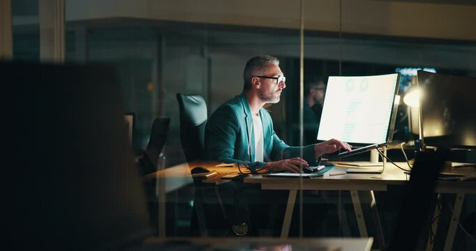 Night, business and senior man with computer, journalist or website for breaking news. Person, employee or political analyst with pc, evening or research for article, editing or pressure for deadline