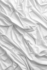 Obraz premium Crumpled white fabric displaying texture and softness in a minimalist setting
