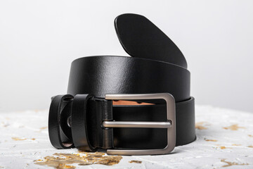 handmade black leather men's belt on white background