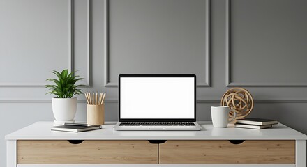 Fototapeta premium Comfortable workplace with laptop, houseplant and stationery on table. Drawers in mocha mousse shade. Trendy color of 2025 year in interior design