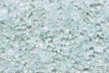 Crushed glass sand texture on white background