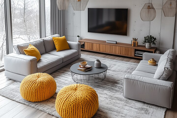 Top view of grey sofa and yellow knitted pouffes near tv unit. Minimalist interior design of modern living room, home.