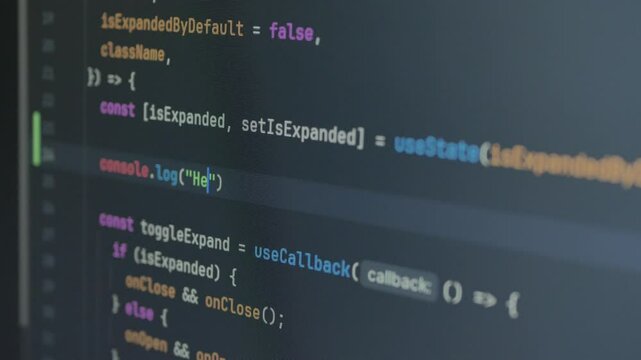 Typing "Hello, Next.js" in code editor, console. Technology background for software developer and Computer script concept. Programming React.js, Next.js, JavaScript, HTML. Close up video