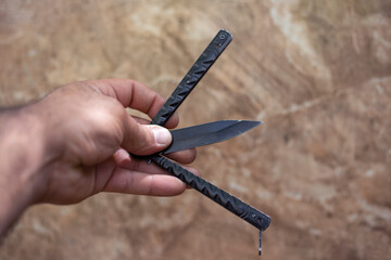 knife in man hand close up