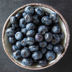 blueberry ripe juicy berries vitamins natural product snack fresh tasty food dish gourmet food background on the table rustic food top view copy space keto and paleo diet Vegetarian and vegan food