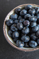 blueberry ripe juicy berries vitamins natural product snack fresh tasty food dish gourmet food background on the table rustic food top view copy space keto and paleo diet Vegetarian and vegan food