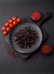 Jerky, dried horse meat or beef slices with salt and spices
