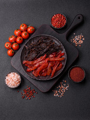 Jerky, dried chicken slices with salt and spices