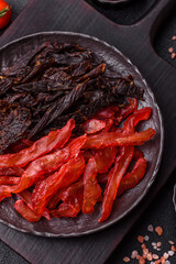 Jerky, dried chicken slices with salt and spices