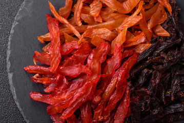 Jerky, dried chicken slices with salt and spices
