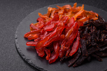 Jerky, dried chicken slices with salt and spices